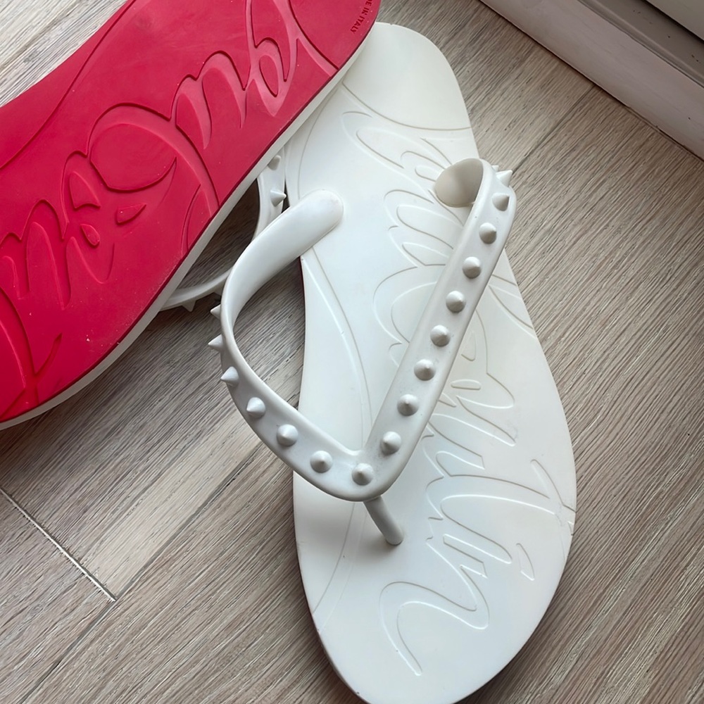 Flip flops with red sole